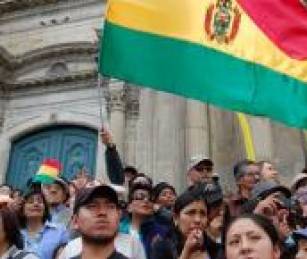 Demonstrators in Bolivia demanded President Evo Morales back down from his plan to increase fuel prices and reroute a planned highway.