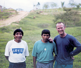 Spring 2002 IRP Fellow Michael Flynn (right) with Anastasio Chop Garcia and Pascual Ortiz, two returned refugees from Xaman, Guatemala.