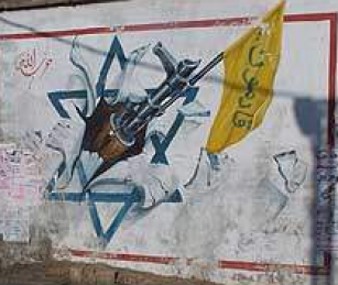 A painting on a wall in a southern suburb of Beirut shows a gun bursting through a Star of David with the words,