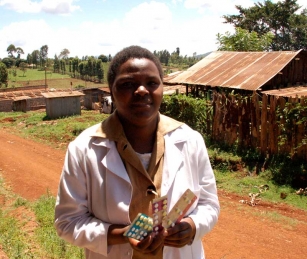 A nurse shows the current malaria treatment.