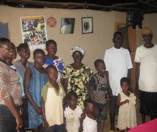 Health Counselor Florence Aluodo (far left) administered home HIV tests to this family in Kogelo,Kenya.
