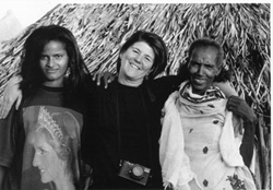 A lone soldier guards the trenches from an acacia tree