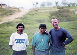 Pew Fellow Michael Flynn with two returning refugees