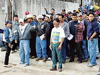 Photo: Manpower of Americas applicants wait at U.S. Consulate in Monterrey, Mexico.