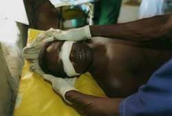 A wounded soldier receives treatment